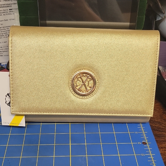 Christian Lacroix Handbags - Christian Lacroix Elegant Gold 9x6x2.5 Clutch NWT